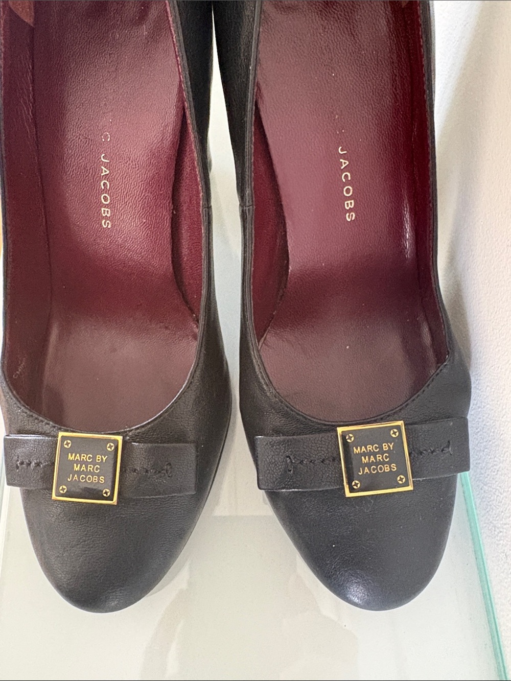 Marc by Marc Jacobs Black Leather Bow Pumps with Gold Plaque Accent